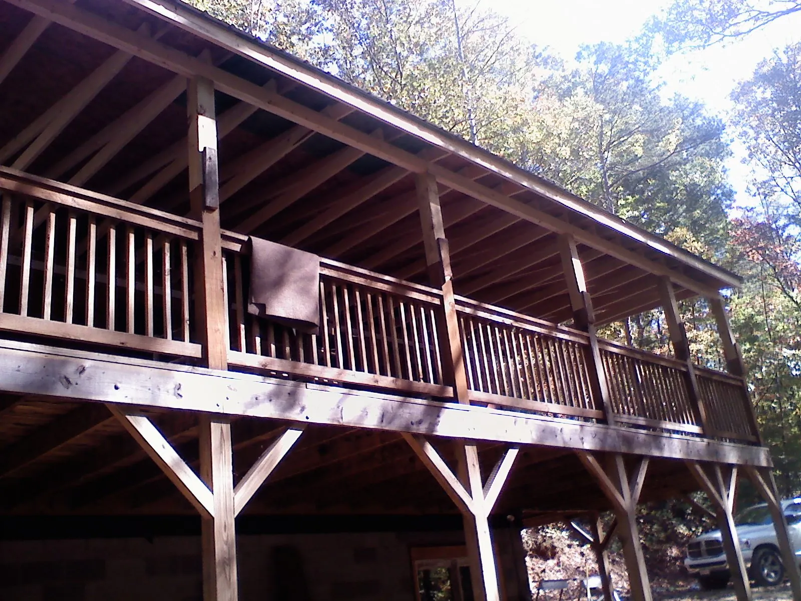 Timber framing under a new elevated porch and deck — Roof Leak Repair in Lafferty by Roofing Brothers